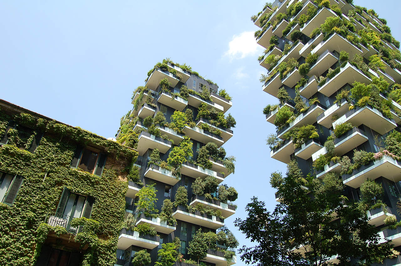 Image of a tall buildings with plants on them