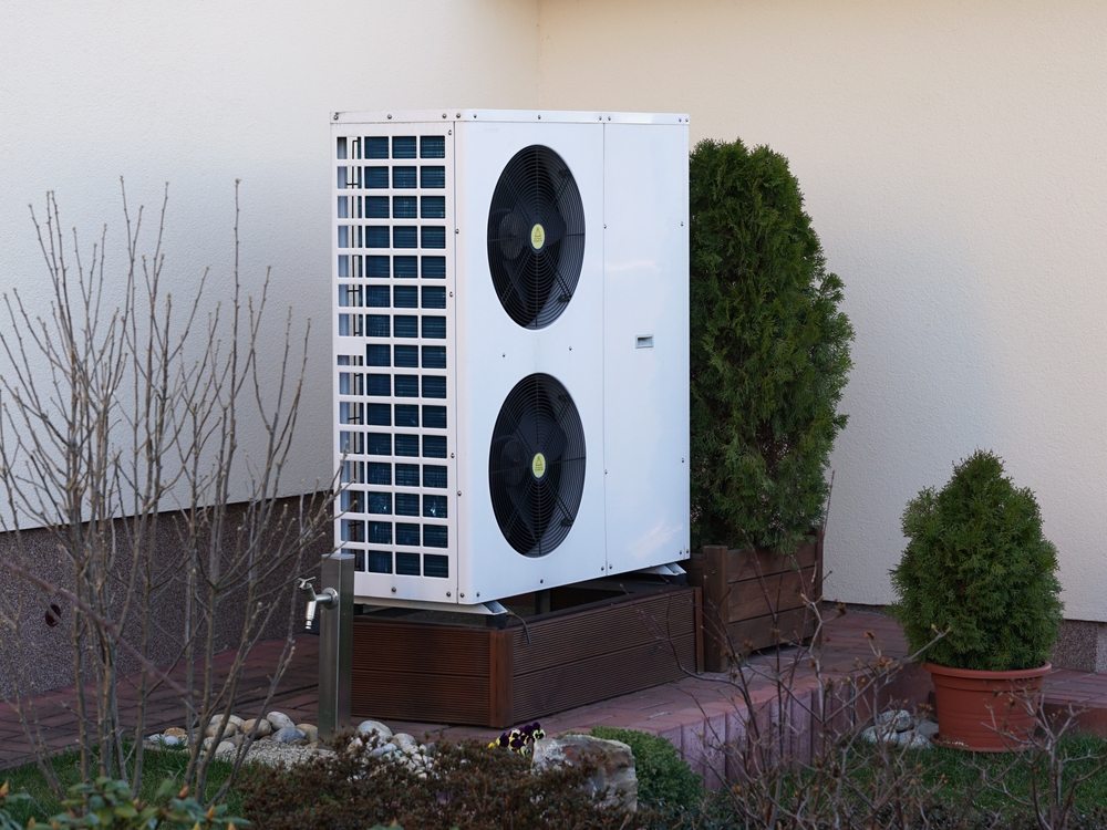 Modern ecological heat pump on garden